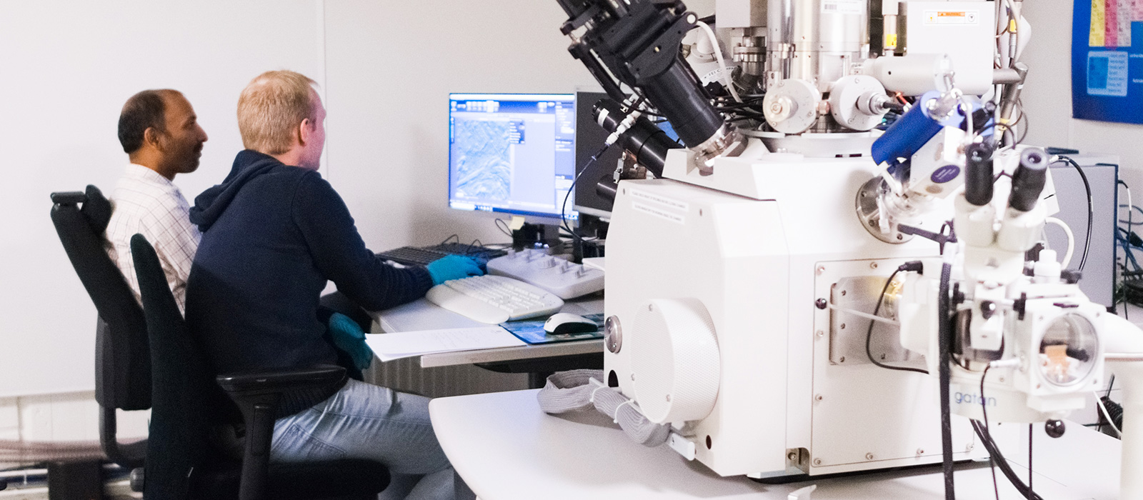Researchers working with the electron microscopy