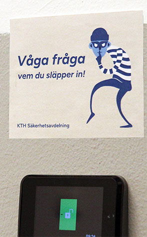 A sticker with text in Swedish and a figure representing a thief.
