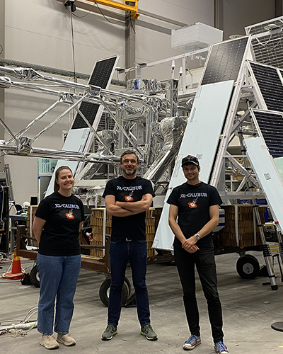 the three KTH team members in front of the telescope at Esrange