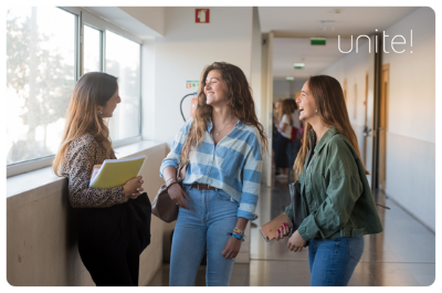 Three students in a corridor